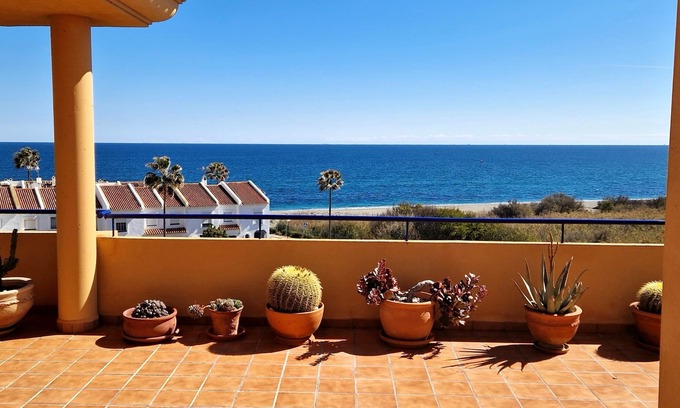 Manilva Apartment | Lovely Vacation Home with South-Facing Terrace & Ocean View