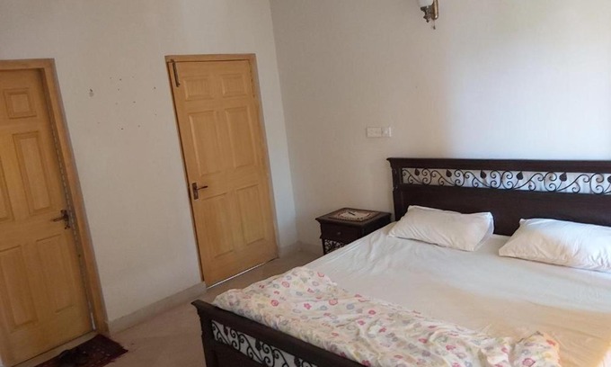 Haridwar House | Comfortable Yukati Palace: Family and Pet Friendly Retreat
