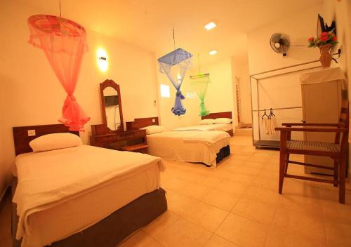 Negombo House | Oceanfront Yuthika Resort: Family-Friendly Getaway Awaits