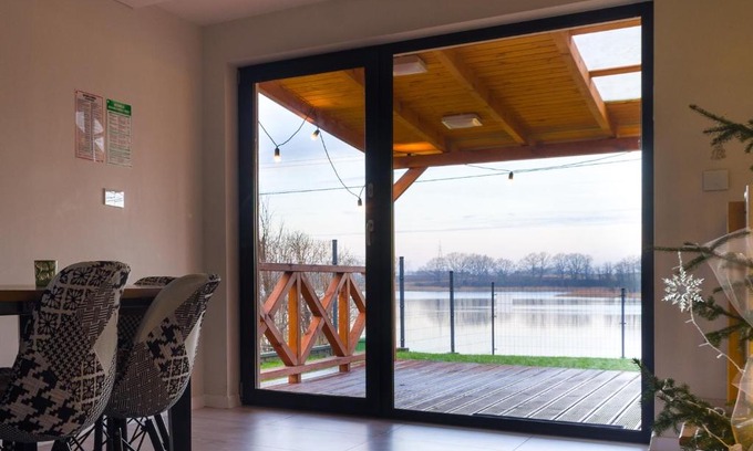 Ilawa House | Lakefront Retreat with Hot Tub & Pet-Friendly Comfort