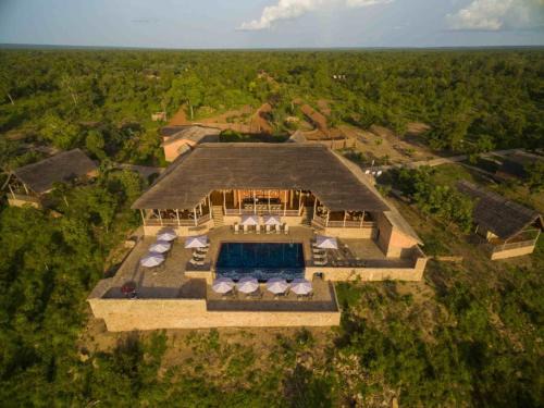 Larabanga Cabin | Discover Zaina Lodge: 4-Star Retreat with Pool & Breakfast