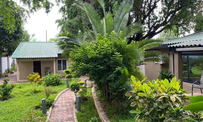 Livingstone Cabin | Discover Zambezi Ultima Lodge: Pool and Breakfast Awaits!