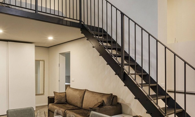 Maddalena Apartment | Modern Zecca Loft: Family-Friendly with Kitchen & Breakfast