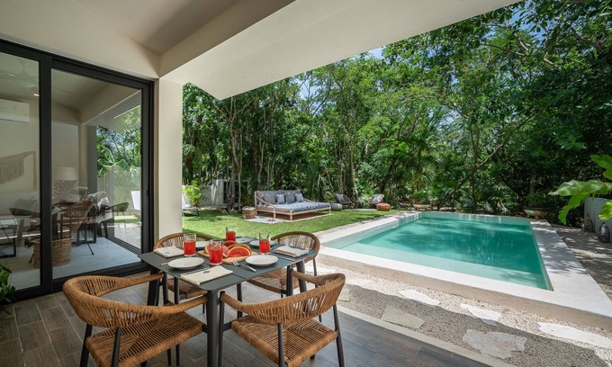 Puerto Aventuras Villa | Elegant Tropical Oasis near Puerto Aventuras Amenities