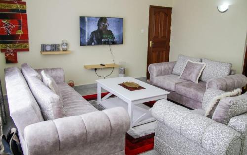 Kisumu Apartment | Elegant Milimani Luxe Apartments: Family-Friendly Retreat