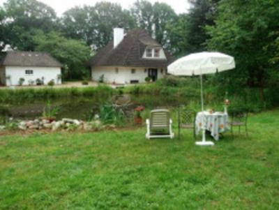 Wiedenborstel Bed & Breakfast | Scenic Zimmer mit Teichblick: Oceanfront Comfort Awaits