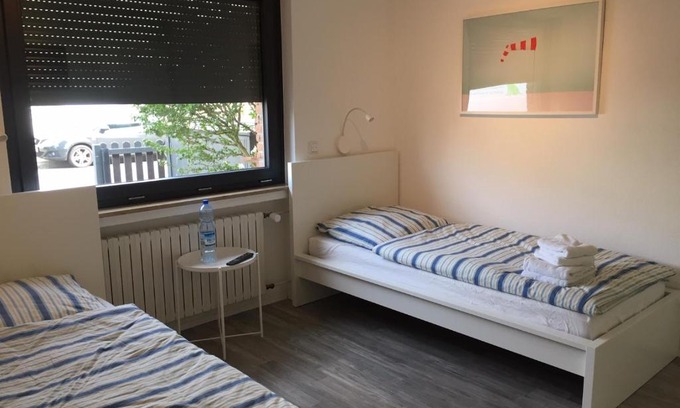 Unterrath Apartment | Convenient Rooms Near Messe and Airport, Pet Friendly