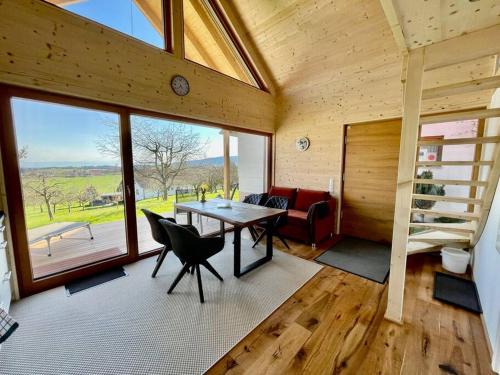 Horgenzell House | Experience Nature in a Two-Story Wood House with Views