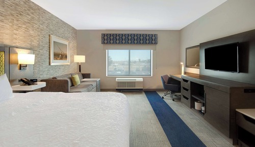 Room, 1 King Bed with Sofa bed, Refrigerator & Microwave
