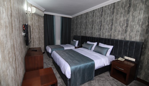 Deluxe Triple Room
