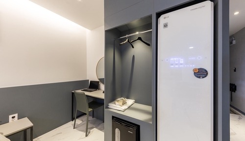 Room (Twin Room (All rooms have 65-inch TVs)