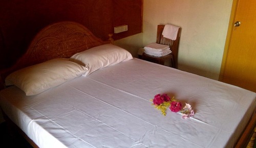 Basic Triple Room, 2 Double Beds, Garden View