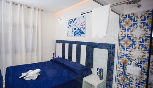 Exclusive Quadruple Room, Courtyard View (Intrigante)