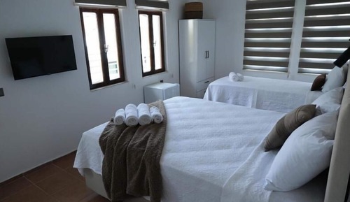Deluxe Triple Room, Balcony, Partial Sea View