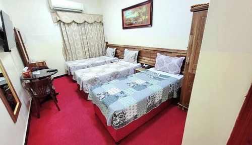 Deluxe Triple Room