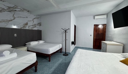 Family Triple Room, Balcony, Garden View