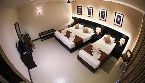 Family Triple Room, Balcony, Garden View