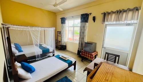 Deluxe Triple Room, Balcony, Beach View