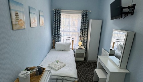 Basic Single Room, Private Bathroom, Partial Sea View