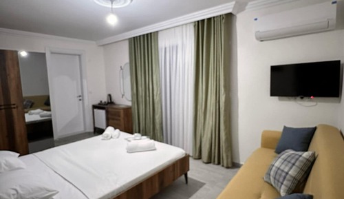 Deluxe Quadruple Room, Balcony, Garden View
