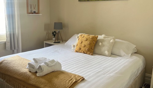 Basic Double Room, 1 Queen Bed, Shared Bathroom