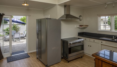 King + 2 Singles (Bunk) Room with Shared Bathroom