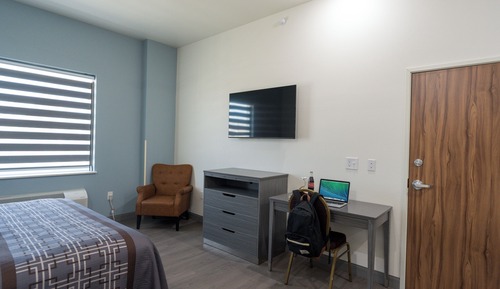 Economy Single Room, 1 King Bed, Non Smoking, Refrigerator & Microwave