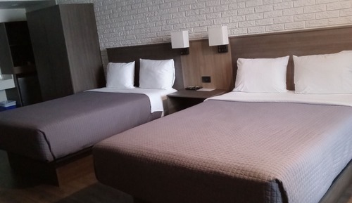 Signature Quadruple Room, 2 Queen Beds, Private Bathroom