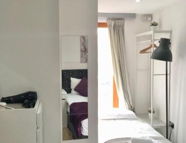 Triple Room with Shared Bathroom
