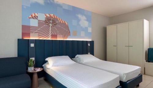 Superior Twin Room with Balcony and Side Sea View