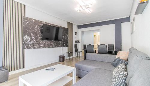 Four-Bedroom Apartment with Balcony 