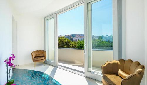 One-Bedroom Apartment with Balcony and Sea View