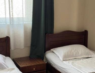Standard Twin Room with Shared Bathroom