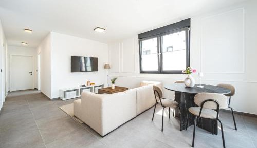 Three-Bedroom Apartment with Balcony