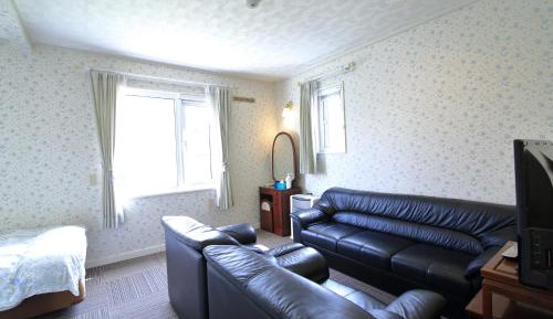 Quadruple Room with Private Bathroom