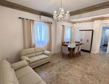 Four-Bedroom Apartment with Balcony 