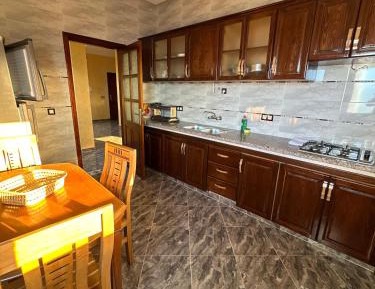 Two-Bedroom Apartment with Balcony