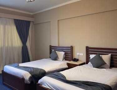 Four-Bedroom Apartment with Balcony 