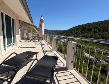 Two-Bedroom Apartment with Balcony and Terrace
