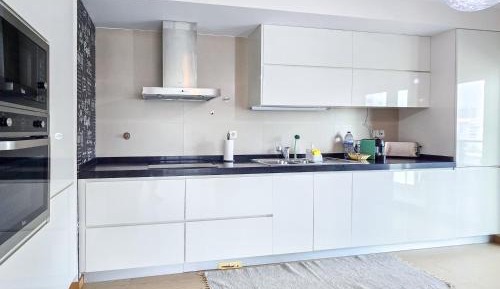 Three-Bedroom Apartment with Balcony