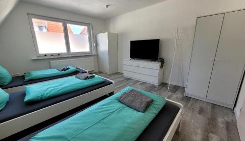 Four-Bedroom Apartment with Balcony 