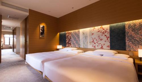 Deluxe Corner Room with Two Queen Beds