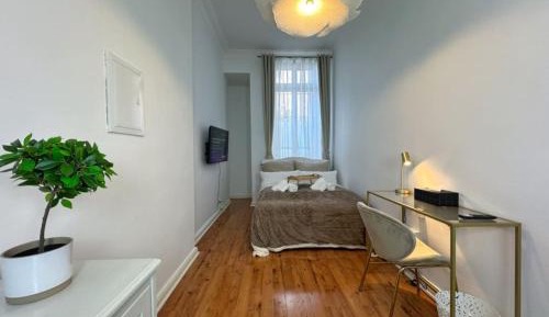 Queen Room with Shared Bathroom
