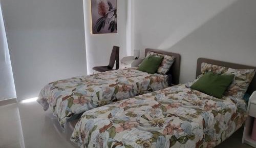 Three-Bedroom Apartment with Balcony