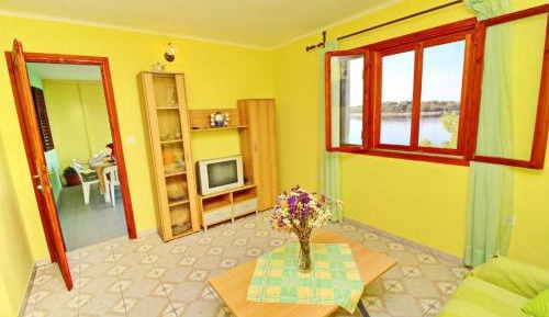 Three-Bedroom Apartment with Terrace and Sea View