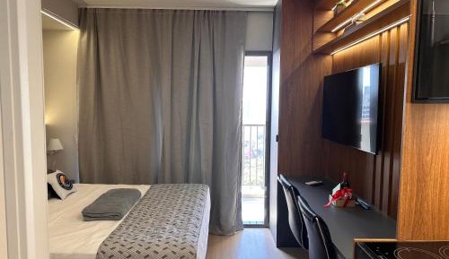 One-Bedroom Apartment with Balcony and City View