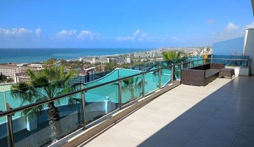 Three-Bedroom Apartment with Sea View