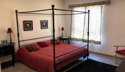 Four-Bedroom Apartment with Balcony 