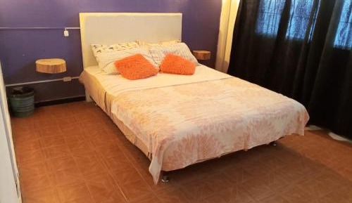 Queen Room with Shared Bathroom