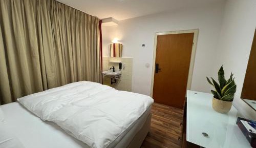 Queen Room with Shared Bathroom